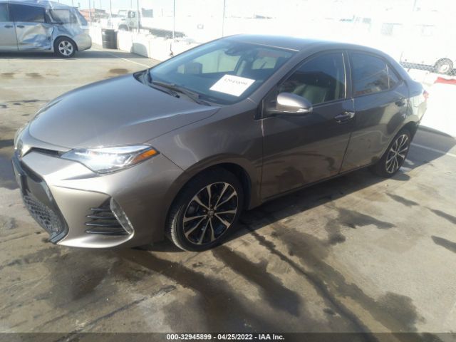 Photo 1 VIN: 5YFBURHE5JP750017 - TOYOTA COROLLA 