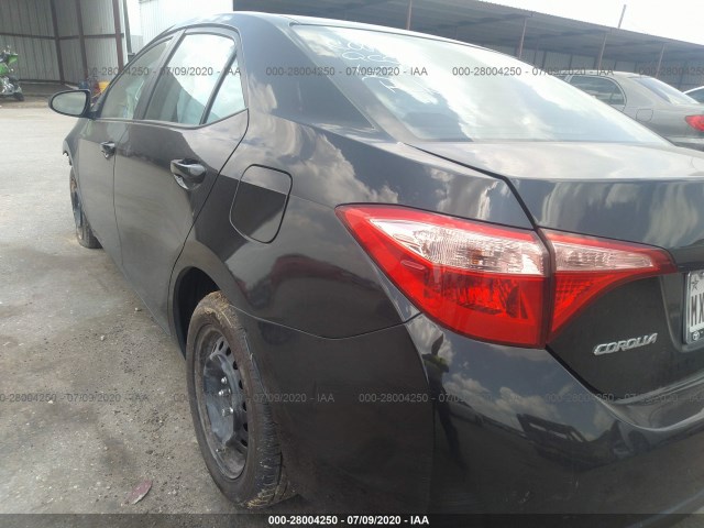 Photo 2 VIN: 5YFBURHE5JP750504 - TOYOTA COROLLA 