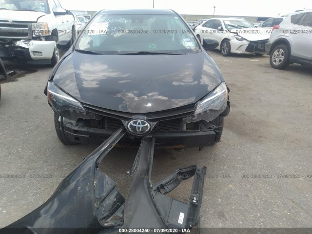 Photo 5 VIN: 5YFBURHE5JP750504 - TOYOTA COROLLA 