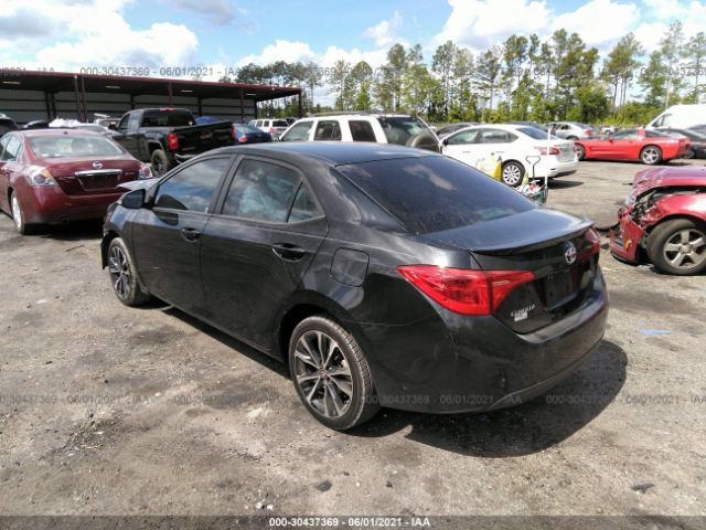 Photo 2 VIN: 5YFBURHE5JP752477 - TOYOTA COROLLA 