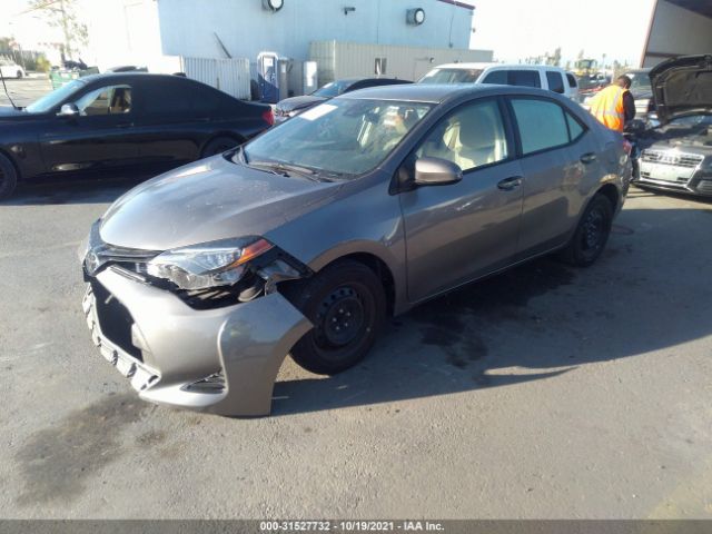 Photo 1 VIN: 5YFBURHE5JP758019 - TOYOTA COROLLA L 