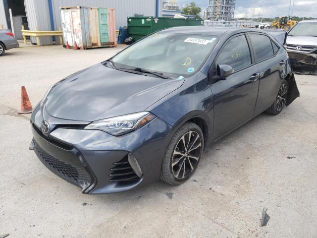 Photo 1 VIN: 5YFBURHE5JP759803 - TOYOTA COROLLA L 