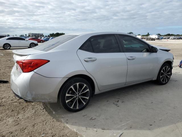 Photo 2 VIN: 5YFBURHE5JP760708 - TOYOTA COROLLA L 