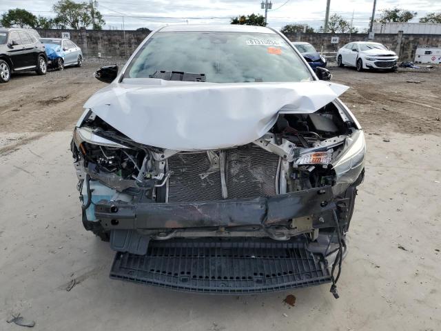 Photo 4 VIN: 5YFBURHE5JP760708 - TOYOTA COROLLA L 