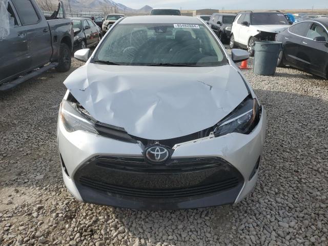 Photo 4 VIN: 5YFBURHE5JP775189 - TOYOTA COROLLA L 