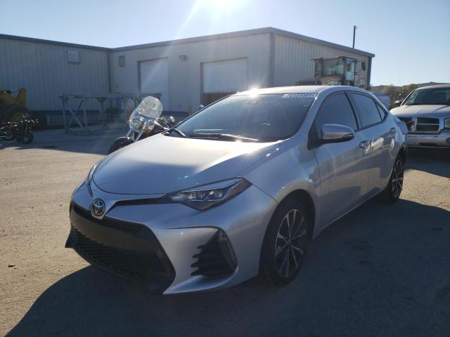 Photo 1 VIN: 5YFBURHE5JP784734 - TOYOTA COROLLA L 