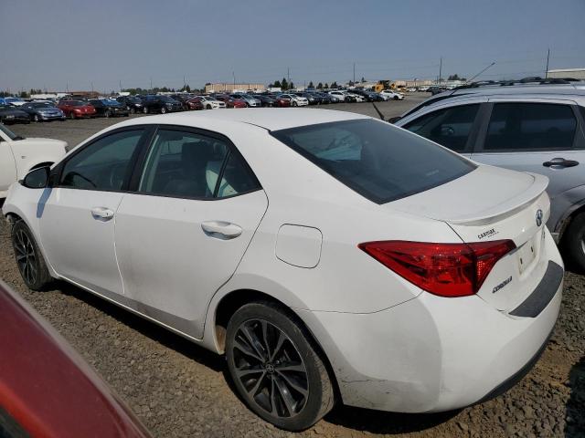 Photo 1 VIN: 5YFBURHE5JP787469 - TOYOTA COROLLA L 