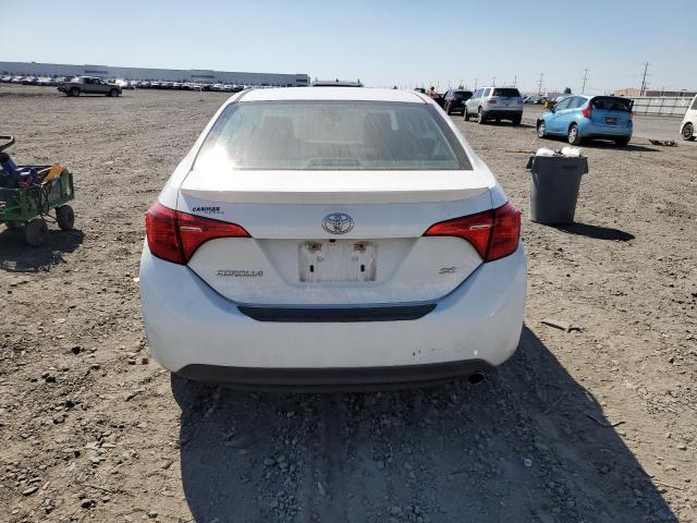 Photo 5 VIN: 5YFBURHE5JP787469 - TOYOTA COROLLA L 