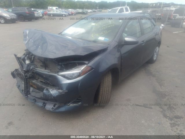 Photo 1 VIN: 5YFBURHE5JP791828 - TOYOTA COROLLA 