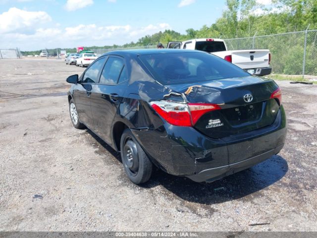 Photo 2 VIN: 5YFBURHE5JP797497 - TOYOTA COROLLA 