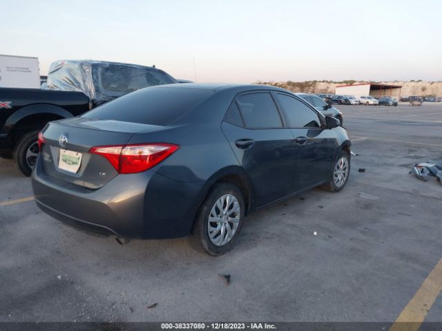 Photo 3 VIN: 5YFBURHE5JP805016 - TOYOTA COROLLA 