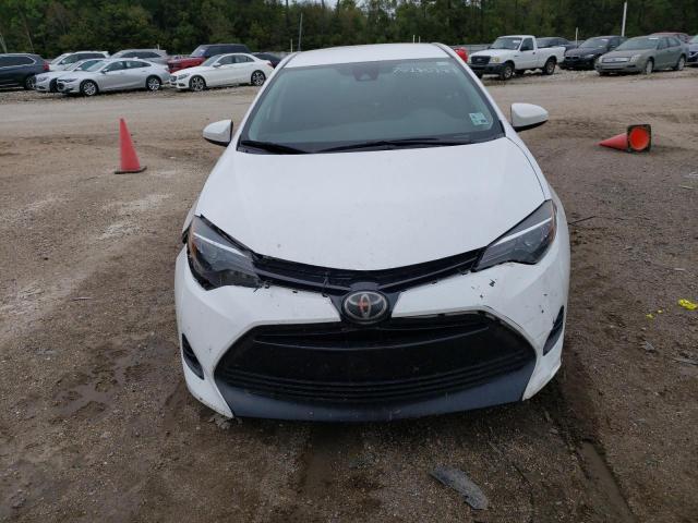 Photo 4 VIN: 5YFBURHE5JP805565 - TOYOTA COROLLA 