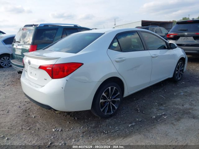 Photo 3 VIN: 5YFBURHE5JP805808 - TOYOTA COROLLA 