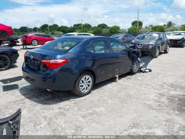 Photo 3 VIN: 5YFBURHE5JP809888 - TOYOTA COROLLA 