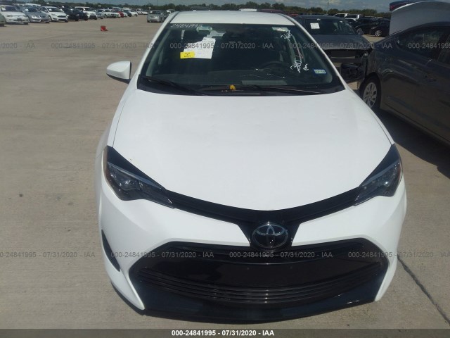 Photo 5 VIN: 5YFBURHE5JP813651 - TOYOTA COROLLA 