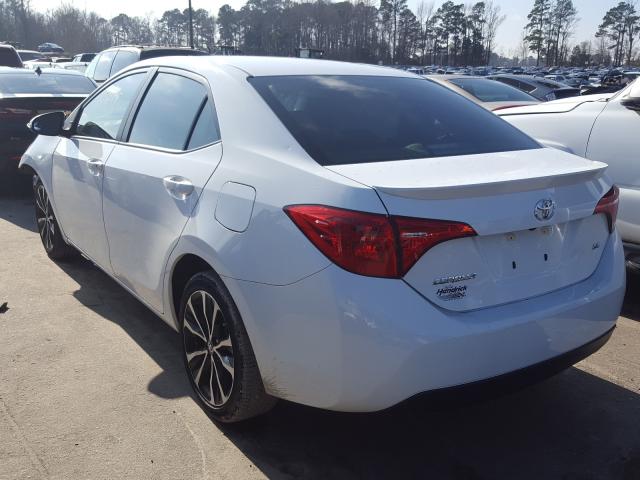 Photo 2 VIN: 5YFBURHE5JP822771 - TOYOTA COROLLA L 