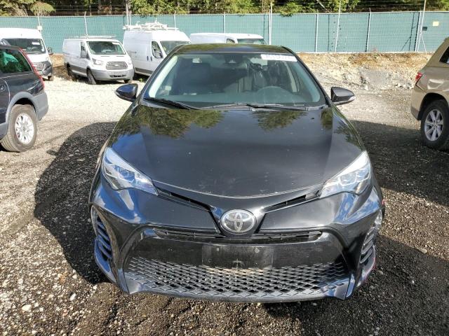 Photo 4 VIN: 5YFBURHE5JP823449 - TOYOTA COROLLA L 