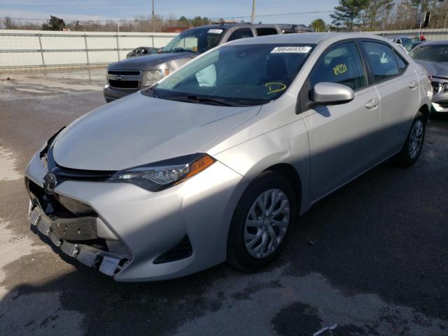 Photo 0 VIN: 5YFBURHE5JP850585 - TOYOTA COROLLA L 