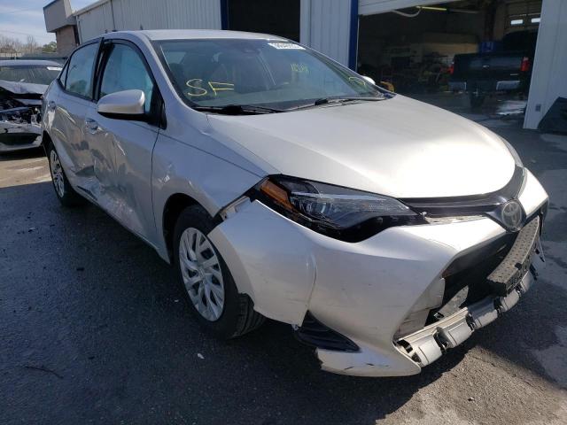 Photo 3 VIN: 5YFBURHE5JP850585 - TOYOTA COROLLA L 