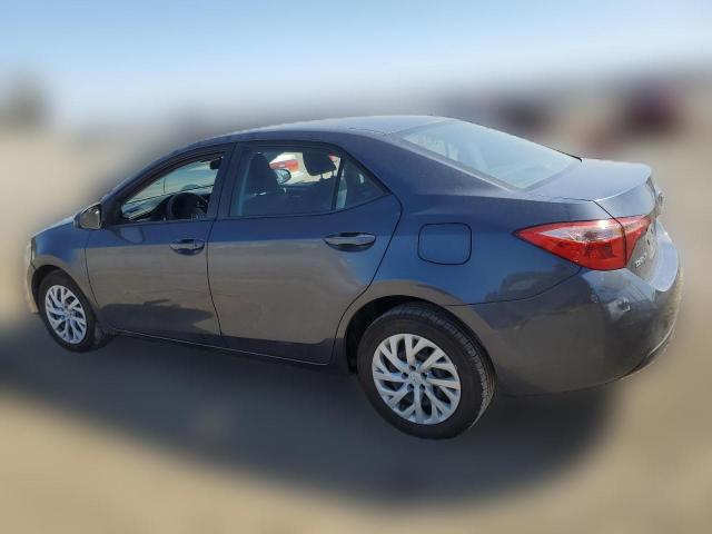 Photo 1 VIN: 5YFBURHE5KP858025 - TOYOTA COROLLA 