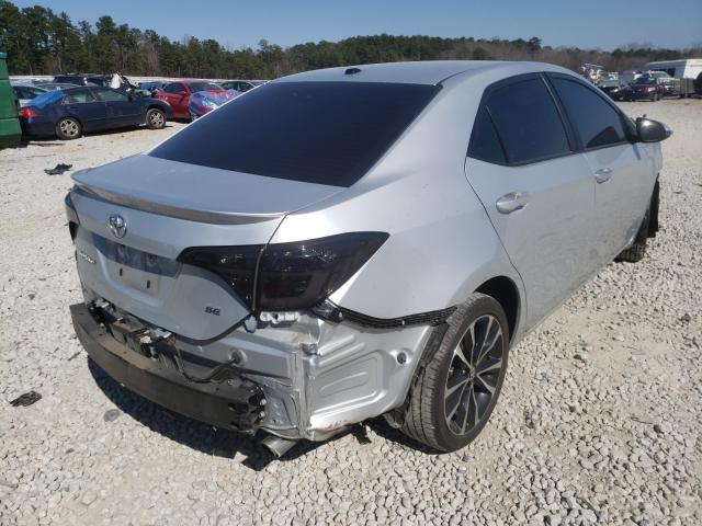 Photo 3 VIN: 5YFBURHE5KP858364 - TOYOTA COROLLA L 