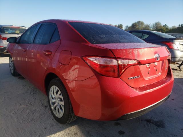 Photo 2 VIN: 5YFBURHE5KP858428 - TOYOTA COROLLA L 