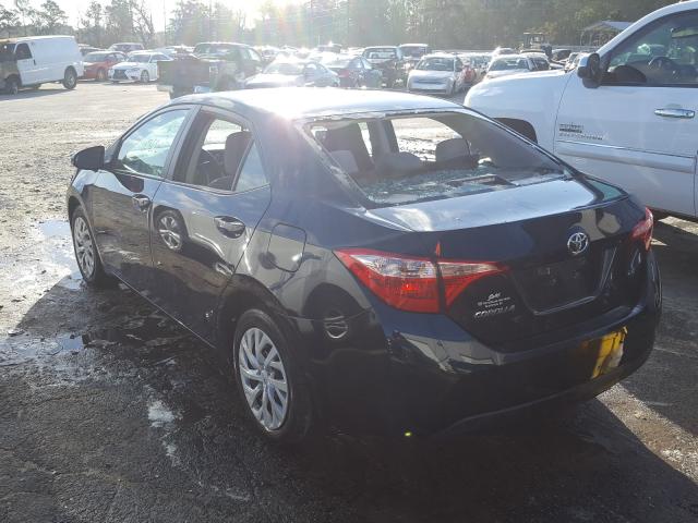 Photo 2 VIN: 5YFBURHE5KP859126 - TOYOTA COROLLA L 