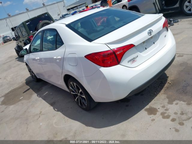 Photo 2 VIN: 5YFBURHE5KP864309 - TOYOTA COROLLA 