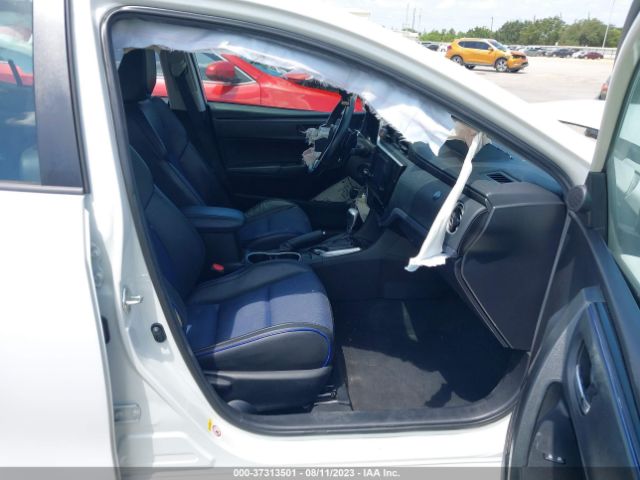 Photo 4 VIN: 5YFBURHE5KP864309 - TOYOTA COROLLA 