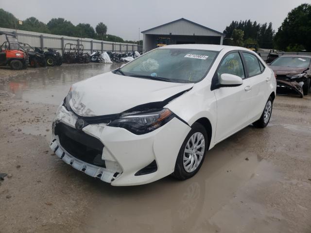 Photo 1 VIN: 5YFBURHE5KP866982 - TOYOTA COROLLA L 