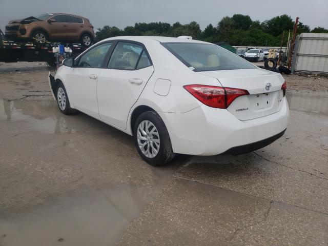 Photo 2 VIN: 5YFBURHE5KP866982 - TOYOTA COROLLA L 