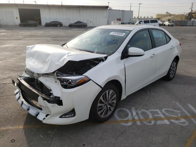 Photo 1 VIN: 5YFBURHE5KP868084 - TOYOTA COROLLA 