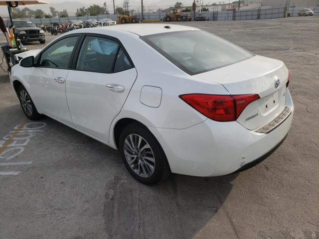 Photo 2 VIN: 5YFBURHE5KP868084 - TOYOTA COROLLA 