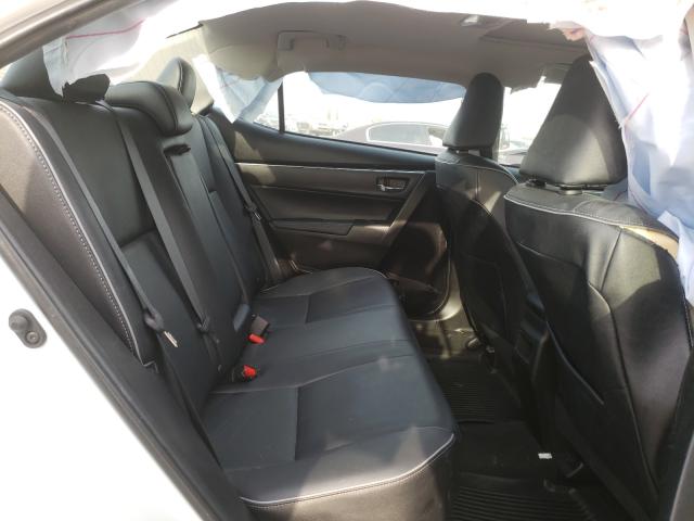 Photo 5 VIN: 5YFBURHE5KP868084 - TOYOTA COROLLA 