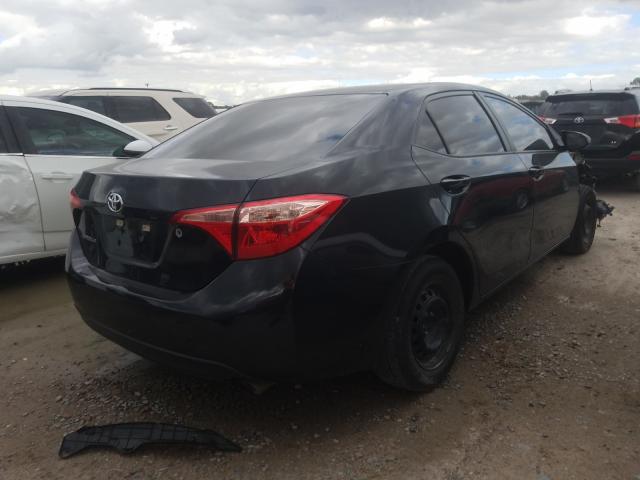 Photo 3 VIN: 5YFBURHE5KP870546 - TOYOTA COROLLA L 