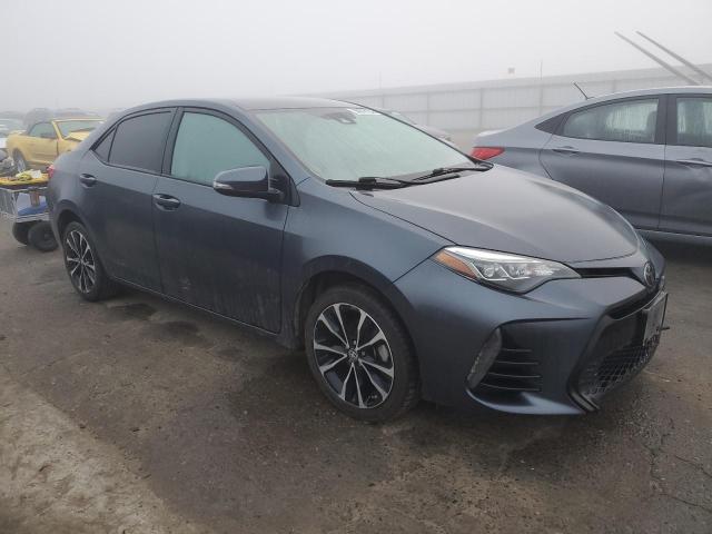 Photo 3 VIN: 5YFBURHE5KP874788 - TOYOTA COROLLA L 