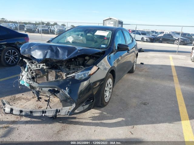 Photo 1 VIN: 5YFBURHE5KP877321 - TOYOTA COROLLA 