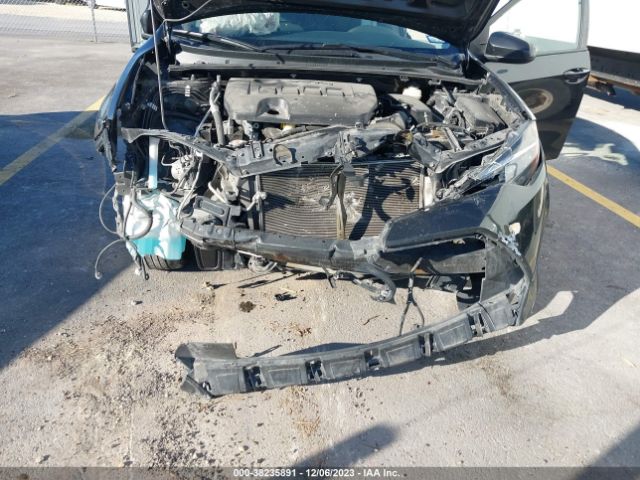 Photo 5 VIN: 5YFBURHE5KP877321 - TOYOTA COROLLA 