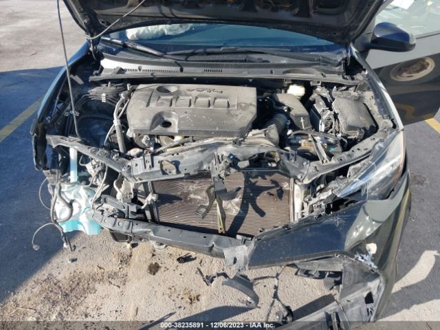 Photo 9 VIN: 5YFBURHE5KP877321 - TOYOTA COROLLA 