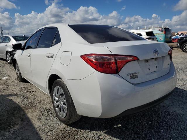 Photo 2 VIN: 5YFBURHE5KP879425 - TOYOTA COROLLA L 