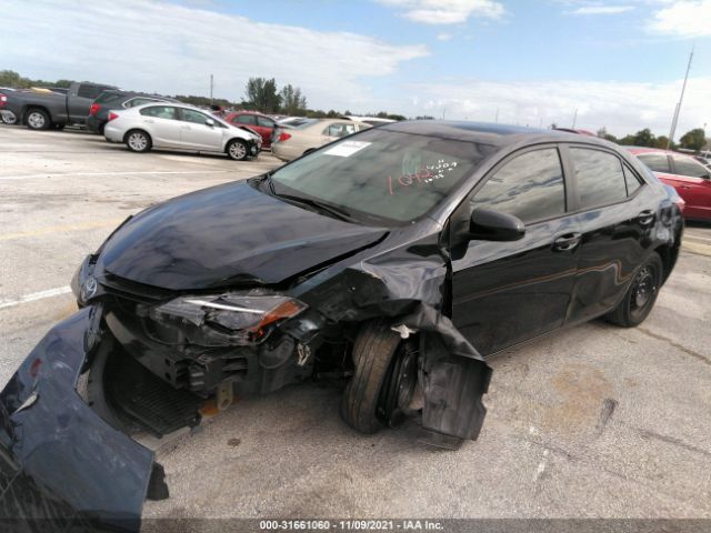 Photo 1 VIN: 5YFBURHE5KP884009 - TOYOTA COROLLA 