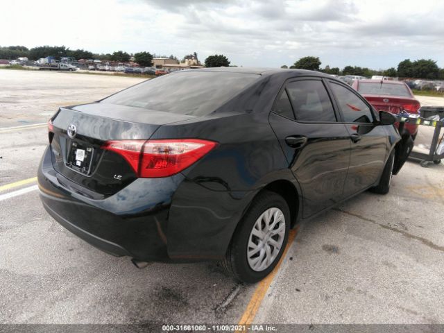 Photo 3 VIN: 5YFBURHE5KP884009 - TOYOTA COROLLA 