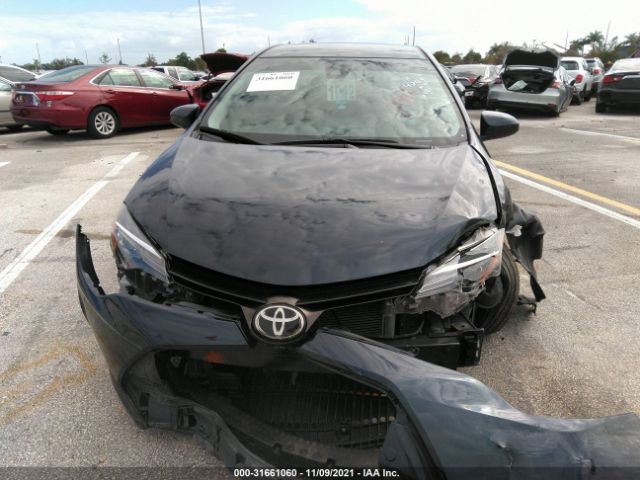 Photo 5 VIN: 5YFBURHE5KP884009 - TOYOTA COROLLA 