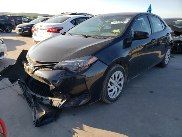 Photo 1 VIN: 5YFBURHE5KP884625 - TOYOTA COROLLA L 