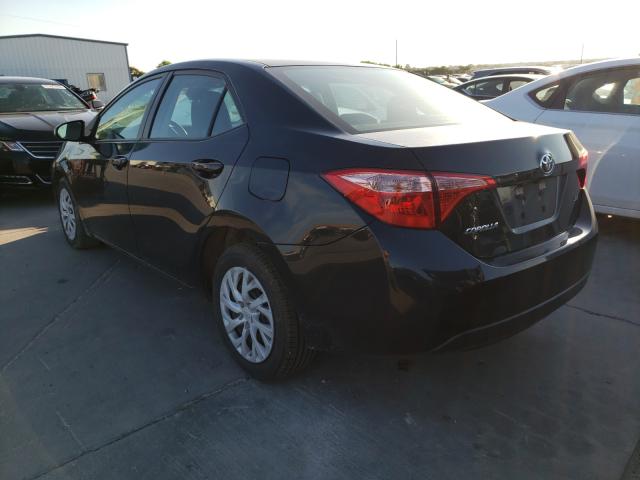 Photo 2 VIN: 5YFBURHE5KP884625 - TOYOTA COROLLA L 