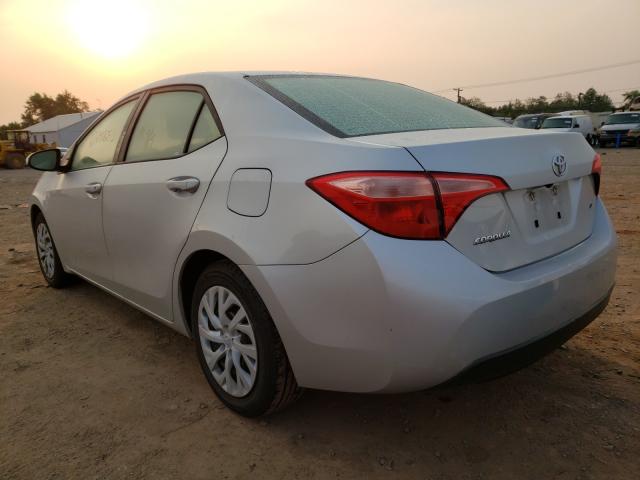 Photo 2 VIN: 5YFBURHE5KP885094 - TOYOTA COROLLA L 