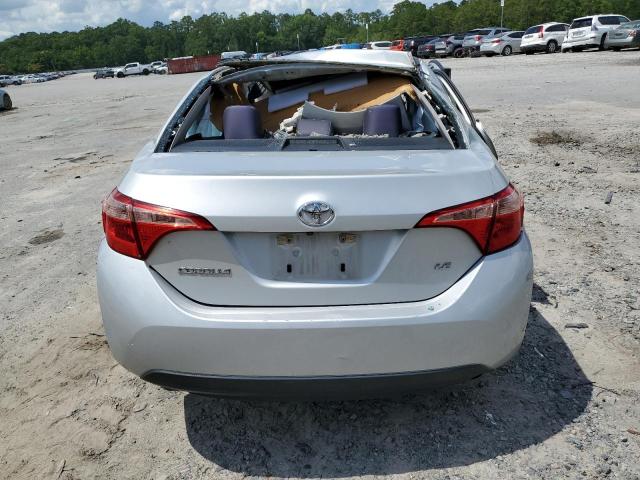 Photo 5 VIN: 5YFBURHE5KP885208 - TOYOTA COROLLA L 