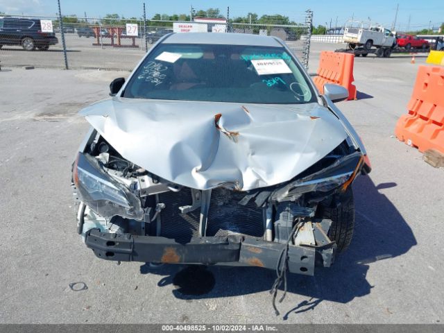 Photo 5 VIN: 5YFBURHE5KP885287 - TOYOTA COROLLA 