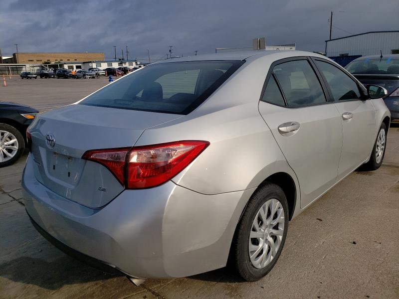 Photo 3 VIN: 5YFBURHE5KP887962 - TOYOTA COROLLA L 