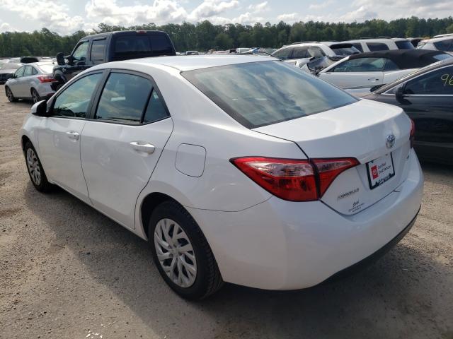 Photo 2 VIN: 5YFBURHE5KP888299 - TOYOTA COROLLA L 